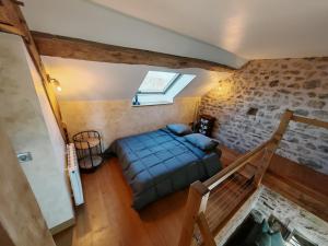 Postel nebo postele na pokoji v ubytování Gîte Anmany