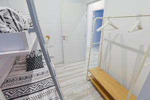 a stairway leading to a room with white walls at Go-Vi Gozar en Vitoria in Vitoria-Gasteiz +33 photos