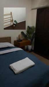 En eller flere senge i et værelse på Searyn Lanta