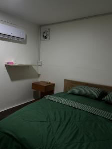 En eller flere senge i et værelse på Searyn Lanta