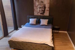 En eller flere senge i et værelse på At dream, logement privatif