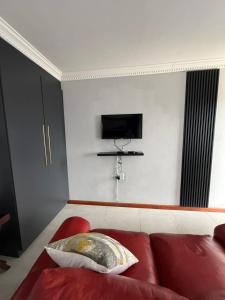 Et tv og/eller underholdning på The Palms Bed & Breakfast