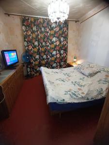 En eller flere senge i et værelse på Східний мікрорайон апартаменти