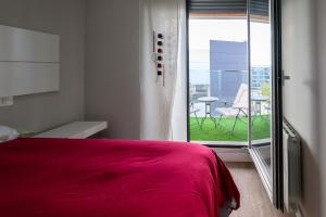 En eller flere senge i et værelse på Apartamento Cervantino + 73 billeder