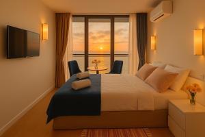 En eller flere senge i et værelse på New Orbi City Center