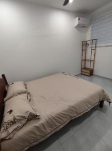 En eller flere senge i et værelse på Sweet Home