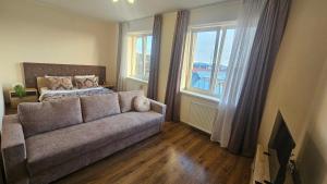 Et opholdsområde på Beautiful Mountain View Apartment