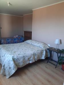 En eller flere senge i et værelse på Loft vista a la bahía