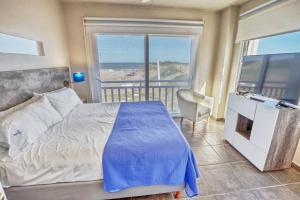 En eller flere senge i et værelse på Torrecillas Carilo