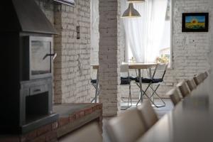Posezení v ubytování Hostal Agrobotiga 7 de Ribera
