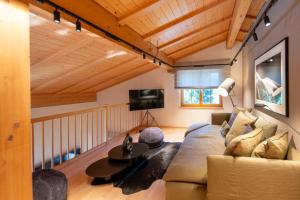 Et tv og/eller underholdning på Chalet Gutsch Andermatt by HomeFlow