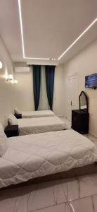 Postel nebo postele na pokoji v ubytování Cairo Villa Hotel