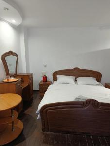 Postel nebo postele na pokoji v ubytování Кімнати поруч з автовокзалом