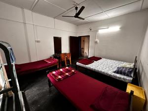 Giường trong phòng chung tại MG stay