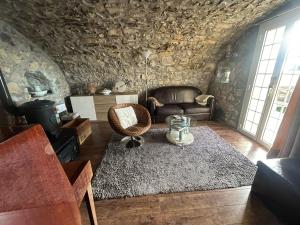 Khu vực ghế ngồi tại Maison de charme piscine vue mer