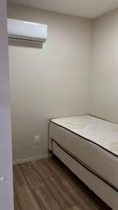 En eller flere senge i et værelse på Gravatá WinterVille Flat 913