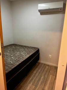 En eller flere senge i et værelse på Gravatá WinterVille Flat 913