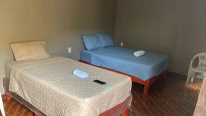 Llit o llits en una habitació de Hotel Krikas
