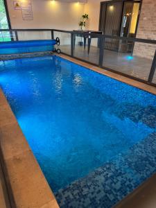 Swimmingpoolen hos eller tæt på וילה סאן טורינו - Vila San Torino