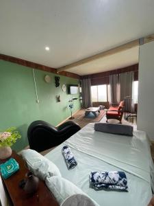 Postel nebo postele na pokoji v ubytování Cabaña El Mirador de las Montañas