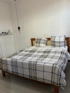 Postel nebo postele na pokoji v ubytování Suzanne house