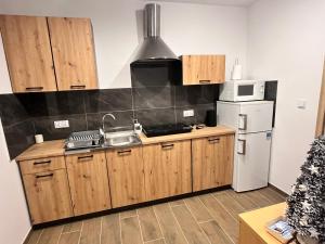 Kuchyň nebo kuchyňský kout v ubytování Agroturystyka u Zosi