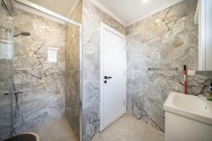 a bathroom with a shower and a sink at My house in Kaş in Kaş +11 photos