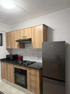 Nhà bếp/bếp nhỏ tại Elevare suites