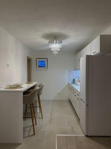 Køkken eller tekøkken på Apartman AS