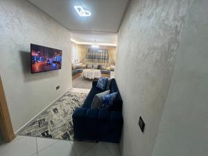 Et tv og/eller underholdning på Dar Lakbira Bouznika