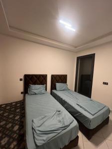 En eller flere senge i et værelse på Dar Lakbira Bouznika + 10 billeder