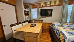 En eller flere senge i et værelse på Charlotte's House