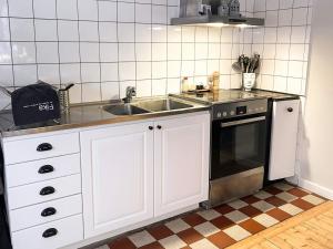 Køkken eller tekøkken på 7 person holiday home in DOCKSTA