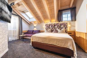 En eller flere senge i et værelse på Apparthotel Sonnenhof