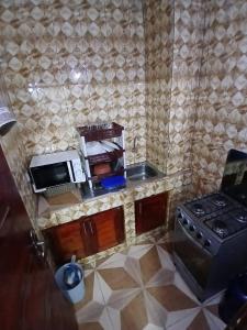 ครัวหรือมุมครัวของ Résidence Latifa Angré