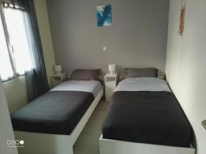 En eller flere senge i et værelse på Castorette, au calme, petit déjeuner compris