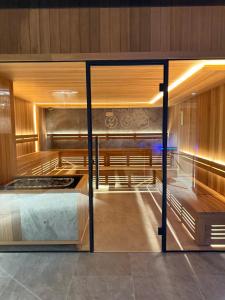 Giường trong phòng chung tại Sea Breeze Apartment z widokiem na morze