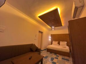 En eller flere senge i et værelse på Chefchaouen Riad