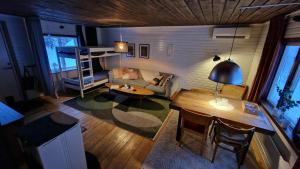 an overhead view of a living room with a loft bed at NorrskensRo in Kiruna