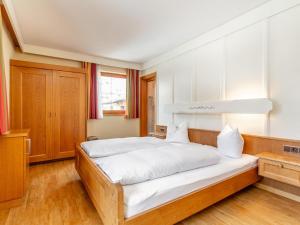 En eller flere senge i et værelse på Landhaus Sonnenzauber