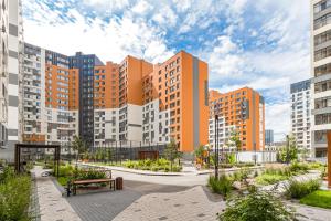 a view of a city with tall buildings at Мандаринка in Taldykolʼ