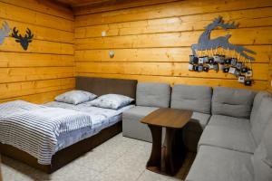 En eller flere senge i et værelse på Тіна + 70 billeder