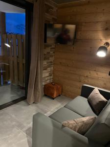 Et opholdsområde på Les Appartements de Maé