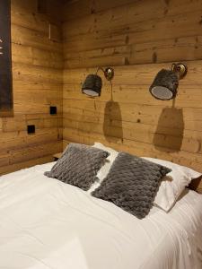 En eller flere senge i et værelse på Les Appartements de Maé + 83 billeder