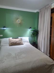 En eller flere senge i et værelse på Incas Suite, con Aguas Termomedicinales + 53 billeder