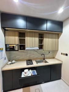 Køkken eller tekøkken på سرايا بلقيس الاولى للشقق المخدومة