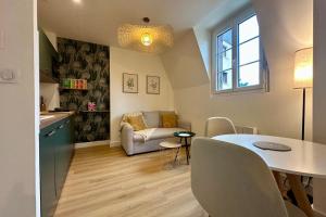 Et opholdsområde på Casa Mialet - Petit Écrin de Douceur au cœur de Brive + 15 billeder