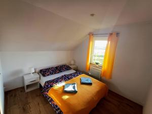 En eller flere senge i et værelse på Idzikowianka