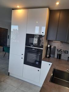 Køkken eller tekøkken på Apartament Patka Wysoki STANDARD