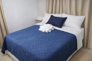 Postel nebo postele na pokoji v ubytování Harmonia - Sunbeha resort, Juan Dolio